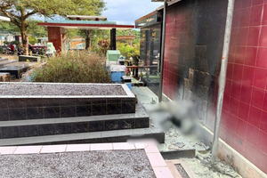 Danh tính thi thể bốc cháy giữa nghĩa trang