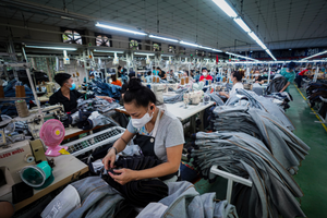 Miễn thuế thu nhập với tiền lương làm thêm giờ, làm ban đêm của người lao động