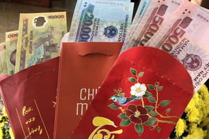 Cha mẹ thu tiền lì xì của con có thể bị phạt 30 triệu?