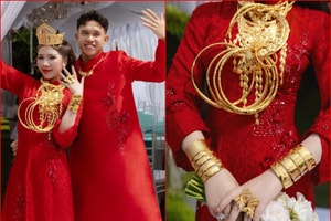 Tiền vệ Việt Nam SN 2001 cưới 'bà chủ tiệm vàng', cô dâu đội vương miện, trang sức phủ kín hai tay
