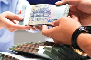 Quy định mới ‘siết’ cho vay đầu tư ra nước ngoài không vượt quá 70% vốn dự án