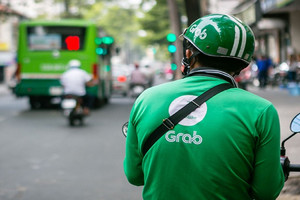 Cạnh tranh quyết liệt với Green SM, Grab vẫn thu 140 triệu USD tại Việt Nam