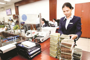 Tiền gửi của người dân tại ngân hàng lên cao kỷ lục