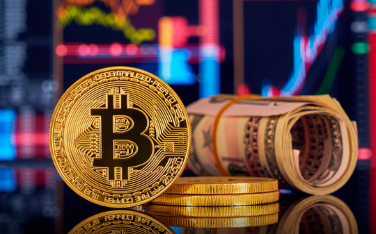 Bitcoin vượt đỉnh sau 2 năm, tăng mạnh lên 52.079 USD