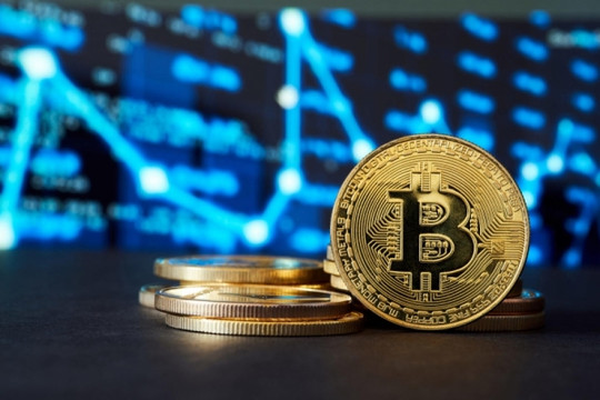 Giá Bitcoin tăng 'sốc', vượt mốc 71.100 USD lần đầu tiên trong lịch sử