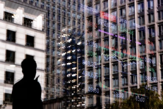 Thị trường tài chính toàn cầu ra sao sau khi Fed hạ lãi suất?