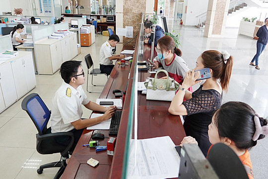 Cải cách thuế không chỉ là giảm thuế suất, cần xóa bỏ 'thuế thời gian'